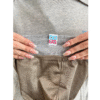 OSAH Hoodie close up with silver fabric that can help with EMF showing logo tag