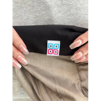 OSAH Hoodie close up with silver fabric that can help with EMF showing logo tag